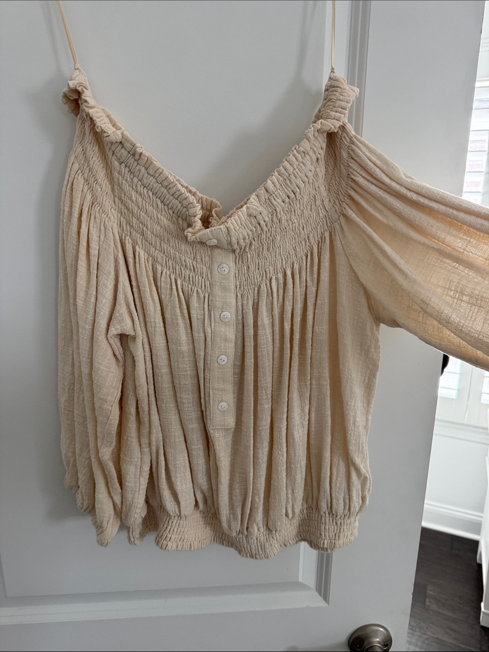 Smocked Off-Shoulder Peasant Blouse in Cream